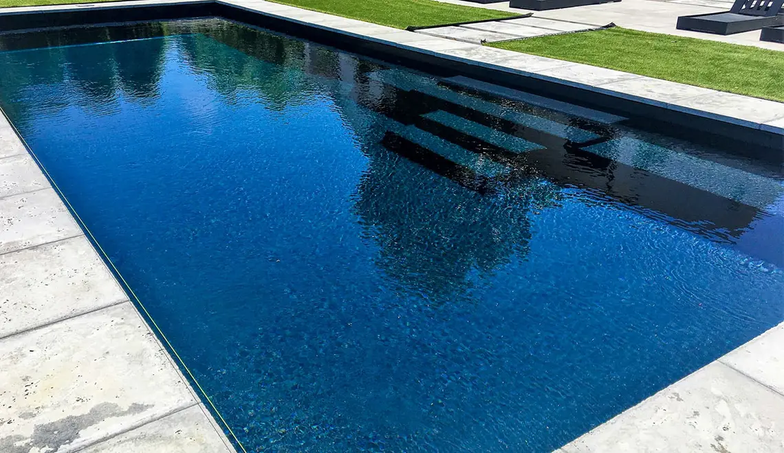 The Grand rectangular fiberglass pool with great side entry steps from Leisure Pools Cincinnati